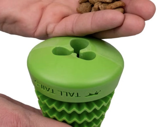 Add your dogs favourite treats to the Evergreen dog toy.