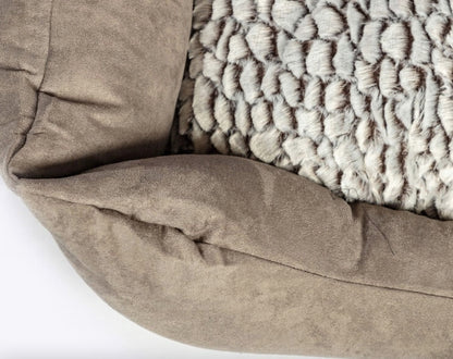 The image shows the faux suede and faux fur fabrics in muted grey tones on this dog bed.