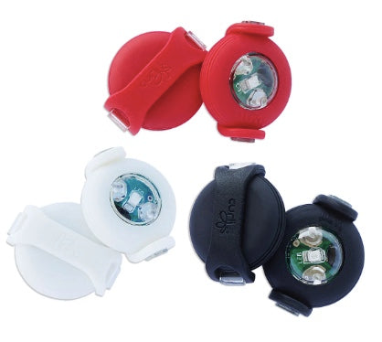 Curli Luumi Lights attach to a harness or collar for safe night  time walking