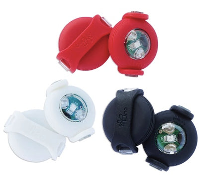 Curli Luumi Lights attach to a harness or collar for safe night  time walking