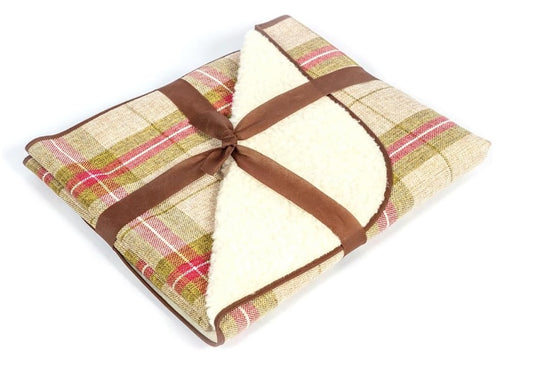 Shows the red and green colouring of the Newton Moss throw for dogs.