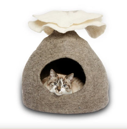 A tabby cat loving its new Bouquet Pure Wool Cat Cave.