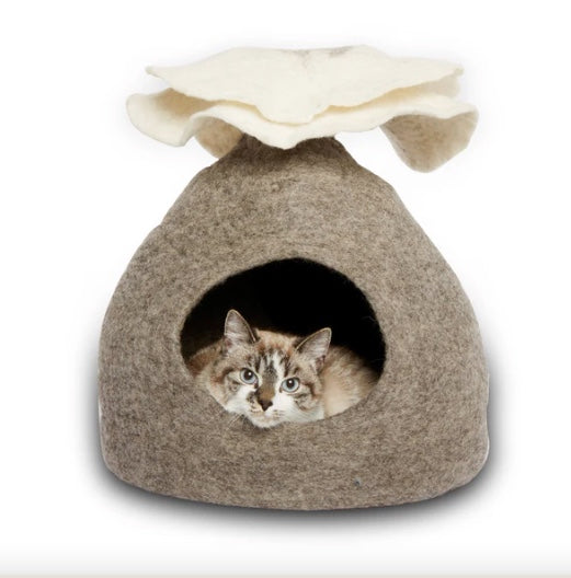 A tabby cat loving its new Bouquet Pure Wool Cat Cave.