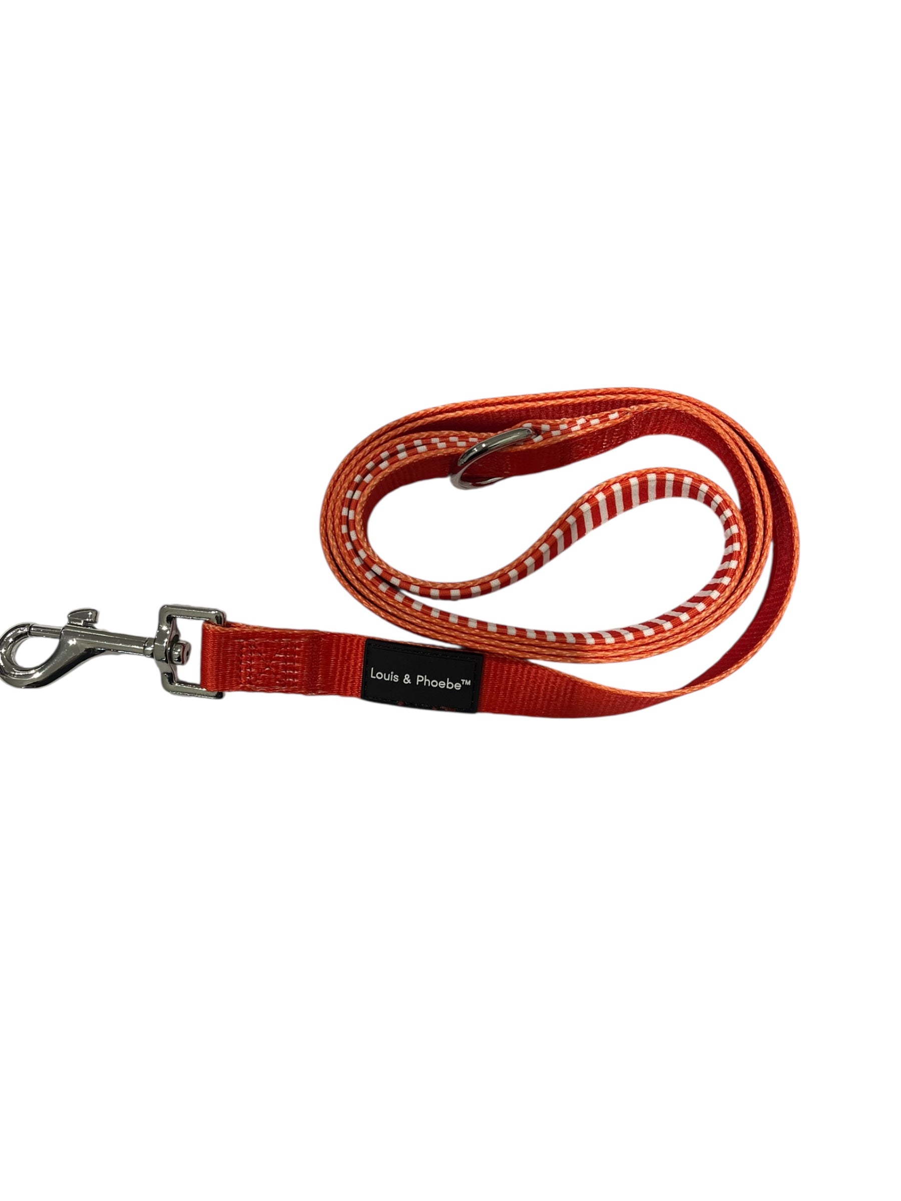 Soft neoprene dog lead with candy stripe on the inside of the handle and red on the outside of the lead. New Zealand.