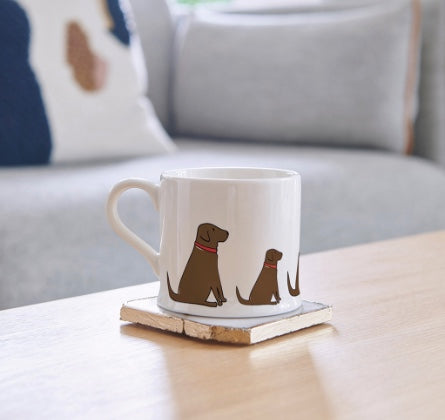 Gorgeous white ceramic mug with a brown labrador on it.